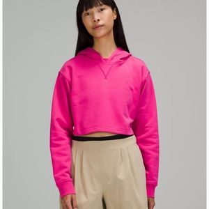 Super lululemon cute cropped hoodie. New with tag. Size 8. Hot pink. Super comfy